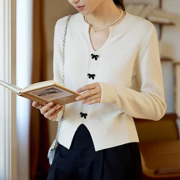 フレンチガーリー リボンスリット入りニットカーディガン