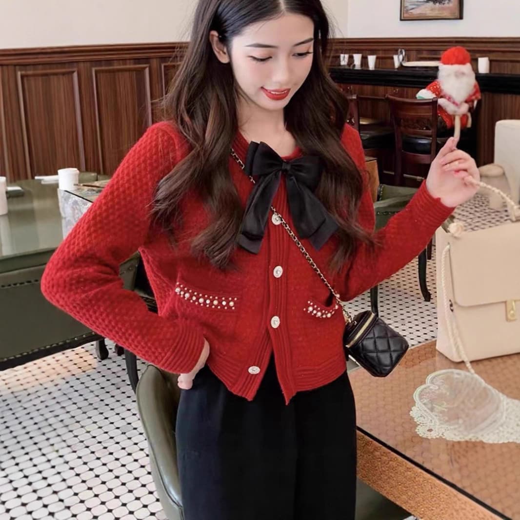 フレンチガーリー パール調ボタン付き大きめリボンニットカーディガン