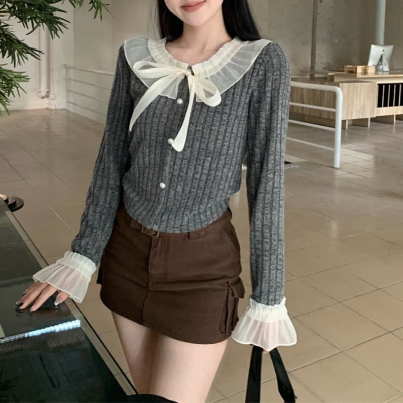 フレンチガーリー 透け感襟元リボン付きリブニットカーディガン